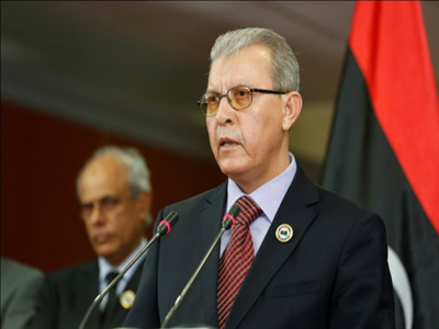 وزير الاقتصاد في الحكومة المؤقتة مصطفى أبو فناس
