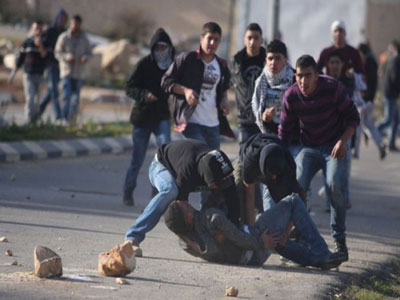 إصابة 34 فلسطينيا في مواجهات مع قوات الاحتلال الاسرائيلي