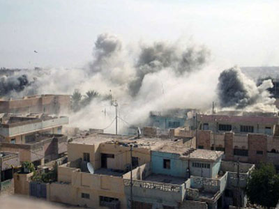 مقتل 12 عراقيا وإصابة 69 في قصف صاروخي بالفلوجة 
