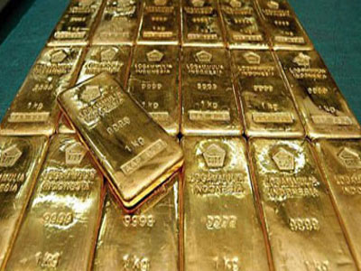 الذهب يقلص خسائره‭ ‬مع تحول الأسهم للهبوط