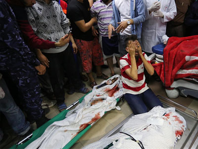 استشهاد ( 8) أطفال وامرأتين، وأصابه ( 15 ) في قصف جوي استهدف منزل بمخيم الشاطئ غربي غزة  