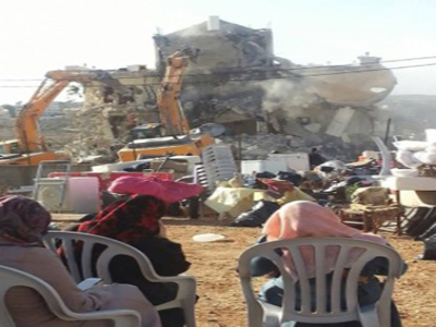 قوات الاحتلال تهدم عمارة سكنية
