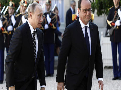 بوتن يتجاهل تردد هولاند ويصر على زيارة باريس