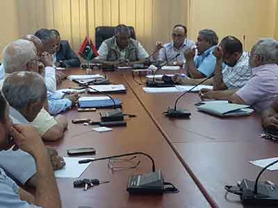 في اجتماع عقد اليوم: الشروع في توزيع مادة الدقيق على كافة المدن الليبية